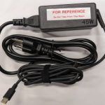Chromebook charger with "for reference" sticker