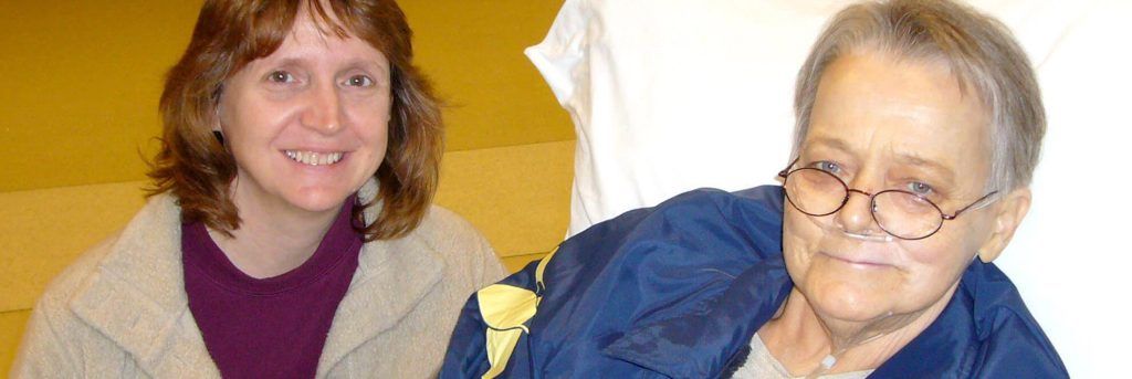 Volunteer with patient on oxygen