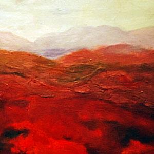 Layers of different hues of red and brown fading into layers of hues of gray and cream.