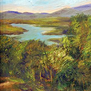 Painting of green forest with lake and mountains in the distance